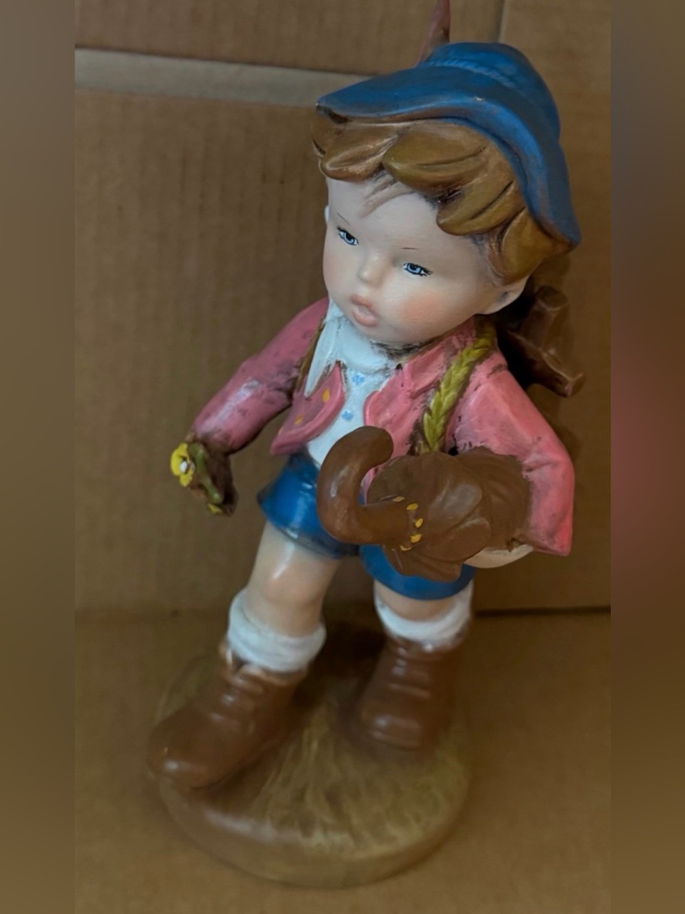 Vintage Boy Figurine with Blue Hat and Umbrella